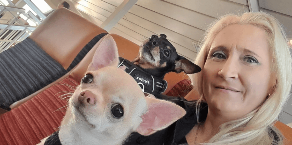 Riette with Tiffany, her white Chihuahua, and Killer, her black Miniature Pinscher